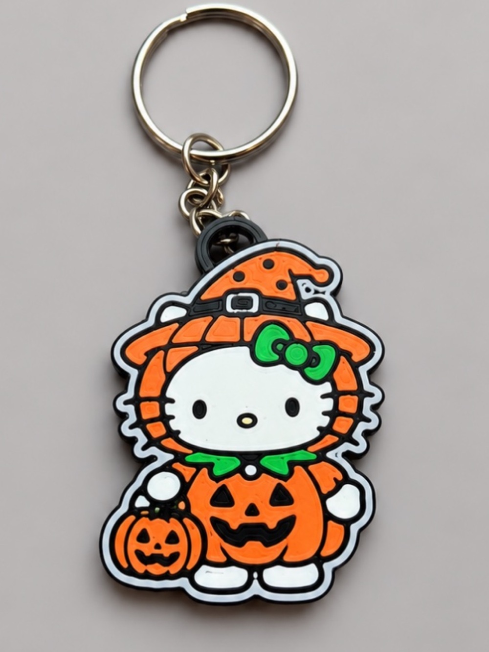 Hello Kitty Orange & Green Pumpkin Witch Keychain